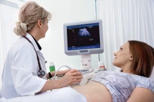 patient getting an abdominal ultrasound exam